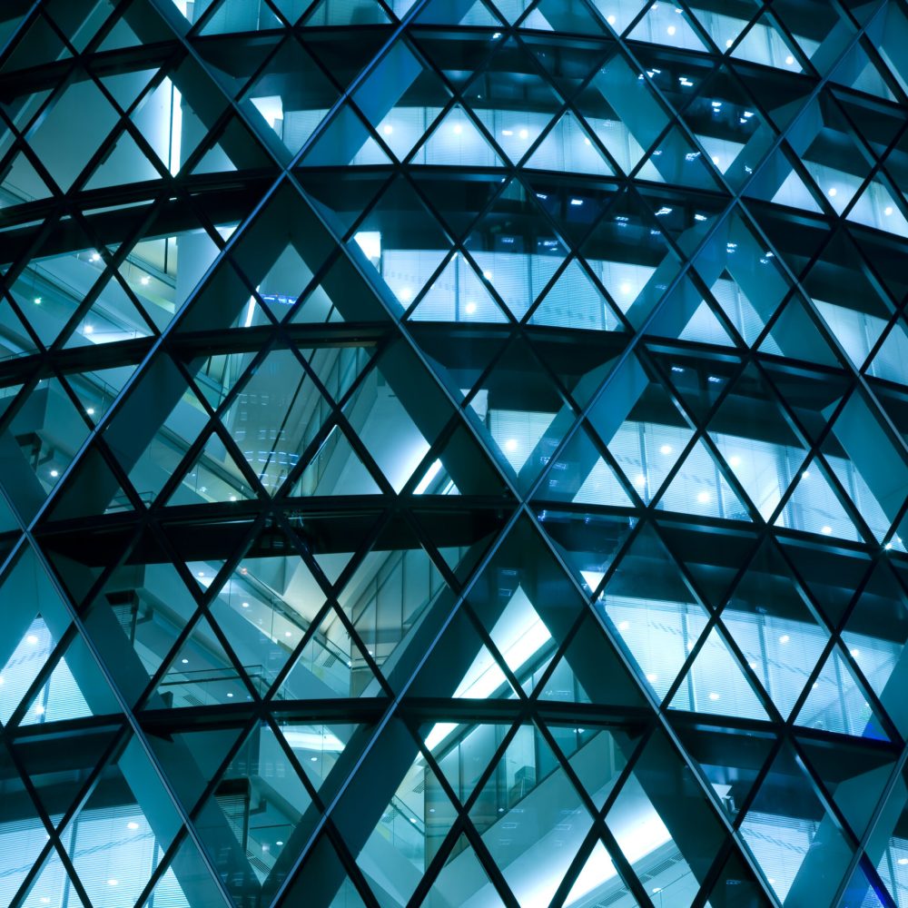 Modern Office Building Illuminated at Night futuristic office building at night, blue toned image, Canon EOS 1Ds Mark III, RAW 16 bit, Adobe RGB